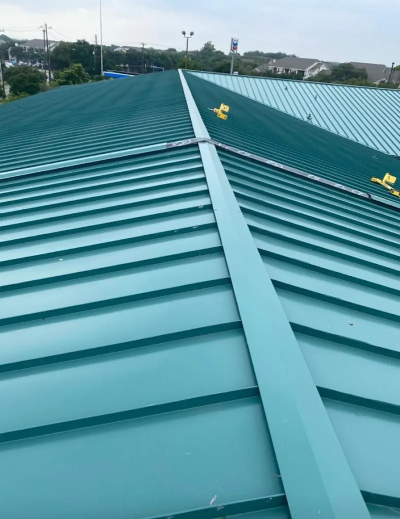 Green commercial metal roof ridge and valley for Metal Roof Repair in Atascadero