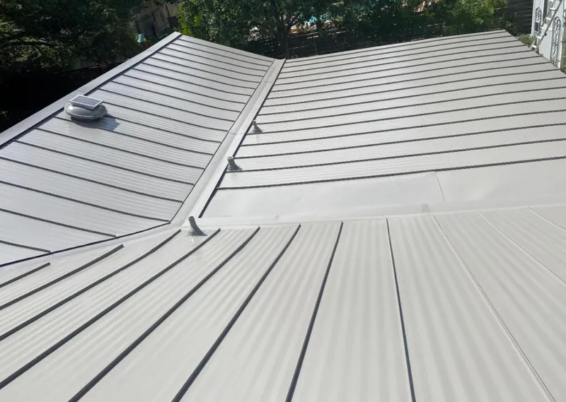 Solar attic fan installed on a metal roof for Roof Ventilation in Atascadero